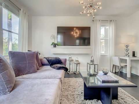 Entertainment delight! Experience our home's living room, equipped with a 50-inch Plasma TV for an endless entertainment options and unforgettable stay.