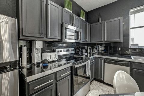 Enjoy modern kitchen fully equipped with state-of-the-art appliances for your culinary adventures.

