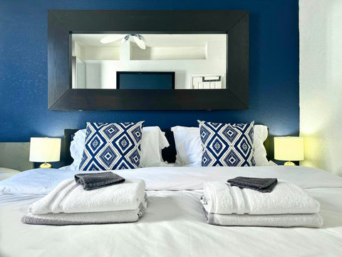 Choose between 1 King Bed or 2 Twin Beds and 1 Twin Bed for a comfortable stay.