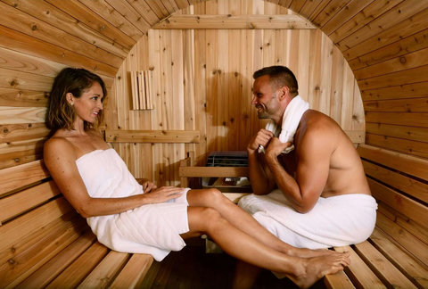 Your exclusive Hand Crafted Cedar Barrel Finish Steam Sauna for up to 6 people to enjoy temperatures of 195ºF. Plenty of room to stretch out and enjoy the sauna heat, plus two exterior benches for cooling off (available from July 1,  3 days' notice).