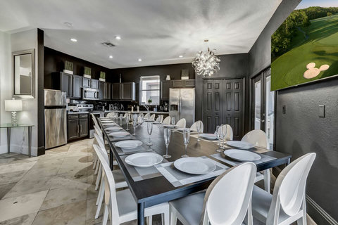 Private Dining Room with your entertaining private chef dinners with Philip Starck designed chairs for exclusive sit down dinners for up to 20 persons inside and 24 persons outside overlooking private pool & golf. Then sip on a cocktail at Fire Pit.