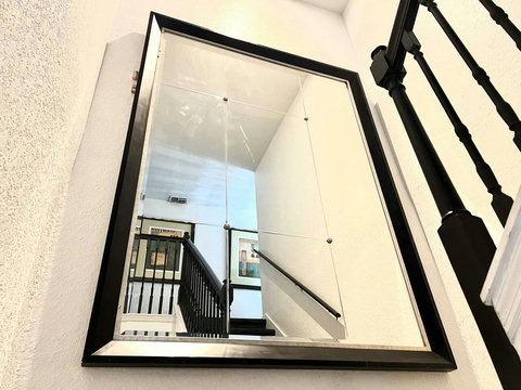 Reflect elegance on every step with our stunning staircase landing mirror. Elevate your home decor with this architectural masterpiece!
