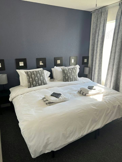 Choose between 1 King Bed or 2 Twin Beds for a restful and customizable stay.

