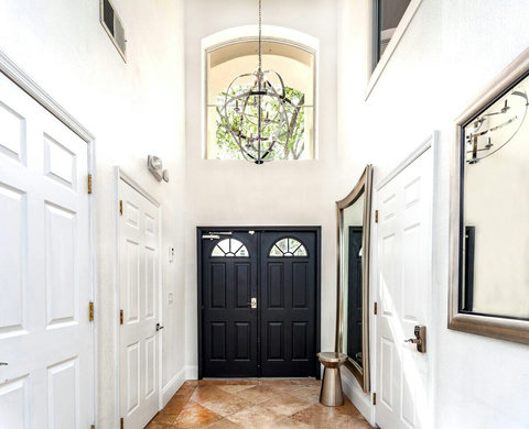 Step into the enchantment - Welcome to the entry foyer design of Disney Mansion. Enjoy the beauty of private pool views, championship golf, and resort clubhouse amenities, including Lap Pool, Pickleball, Tennis, and Children's Playground.
