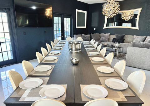 Elevate your dining experience! Our private dining room boasts Philip Starck designed chairs for up to 20 guests indoors and 16 outdoors. Enjoy pool & golf views, then unwind at the Fire Pit with cocktails.
