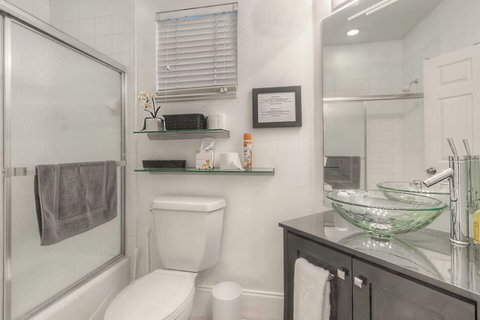 Relax and Refresh - Experience our elegant Bathroom with both Bathtub and Shower, providing the utmost comfort and convenience.