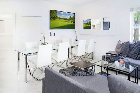 Experience the joy of dining together with ample space for large groups in this inviting dining area.
