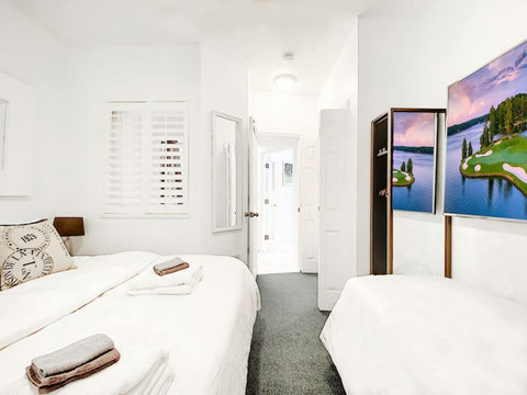 Bedroom Nr 1: can be set up with 1 King Bed or 2 Twin Beds and one extra twin bed. 70-inch Smart TV, and closet.