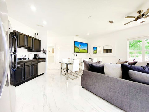 Modern design and open floor plan for social gatherings.
