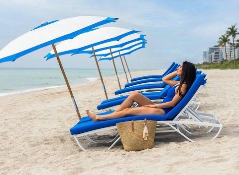 Bike, Powerwalk or Ride to Chairs & Umbrella Rentals at Collins Park Beach as seen in this photo.
