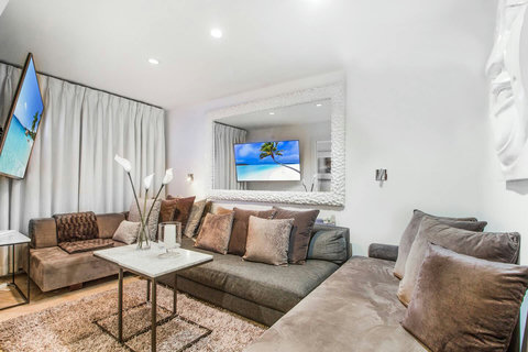 Living room (or can be set up as an optional bedroom suite when needed for large groups, in that case you have use of the dining room and the outdoors for relaxation and socializing).