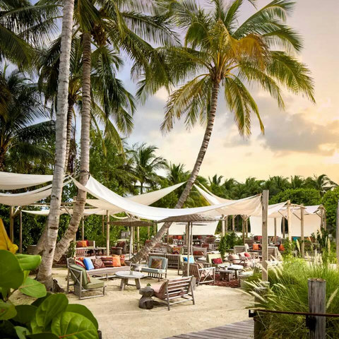 Walk, bike, or enjoy daily FREE round-trip rides to this Beach Club at Collins Park South Beach with some of South Beach's best beachfront dining & bar, or hang out on beach with wonderful full-service beach lounge chairs, and umbrellas rentals. 