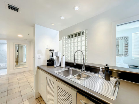 A culinary haven! Discover the second full-size kitchen (2), perfect for a private chef experience. Indulge in gourmet delights.