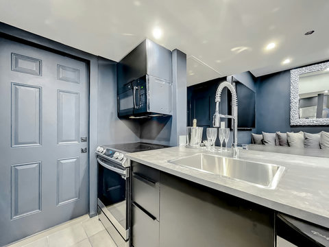 Enjoy Full-size kitchen with brand new Samsung stove, convection oven, air fryer, & island bar with in-kitchen dining. Entertain with 70-inch smart TV in the dining room, 50-inch in the kitchen, stone dining table for up to 12 persons & bar seating.
