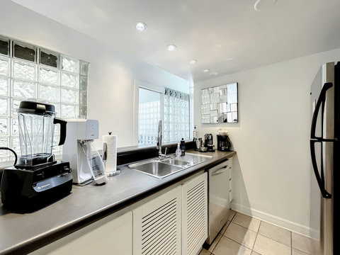 A culinary haven! Discover the second full-size kitchen (2), perfect for a private chef experience. Indulge in gourmet delights.