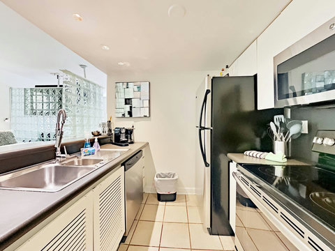 Indulge in our fully equipped kitchen featuring state-of-the-art Vitamix, Nespresso & Keurig Coffee Makers, Soda Stream, full-size stove, oven, microwave, fridge, dishwasher, and laundry machine with dryer.
