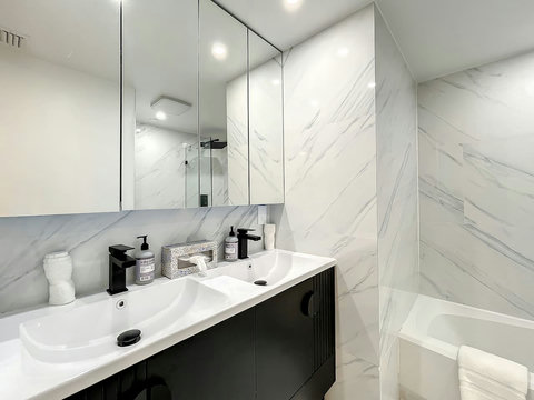 Your oasis of relaxation! Experience contemporary bathrooms with dimmer lights, double sink vanity, shower, & mirrored wall cabinets.
