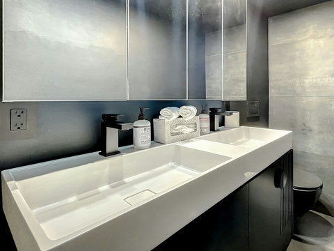 Your oasis of relaxation! Experience contemporary bathrooms with dimmer lights, double sink vanity, shower, & mirrored wall cabinets.
