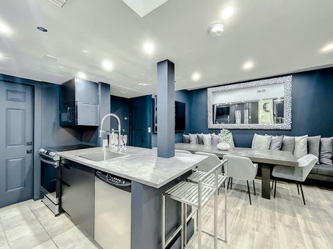 Enjoy Full-size kitchen with brand new Samsung stove, convection oven, air fryer, & island bar with in-kitchen dining. Entertain with 70-inch smart TV in the dining room, 50-inch in the kitchen, stone dining table for up to 12 persons & bar seating.
