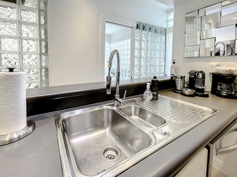 A culinary haven! Discover the second full-size kitchen (2), perfect for a private chef experience. Indulge in gourmet delights.