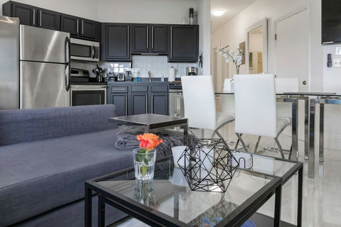 Experience the perfect fusion of entertainment and dining in the living room, designed to provide a seamless space for social gatherings.
