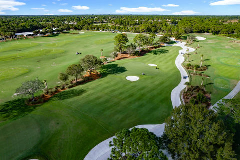 Golfers' paradise! Our villa is nestled next to & overlooking PGA Learning Center, offering free golf on the pitch & put course.