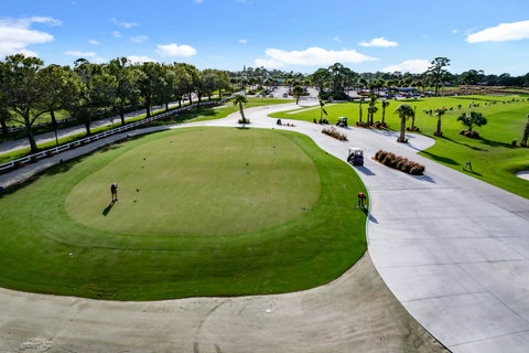 Experience the ultimate golf retreat at our villa, nestled beside and offering breathtaking views of the PGA Learning Center. Enjoy complimentary golf on the pitch and putt course.
