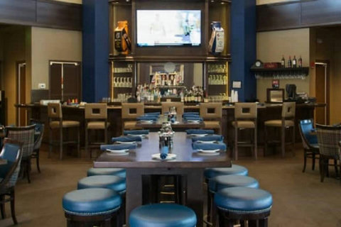 Stay at our villa and savor the delectable offerings at PGA Village Taplow Pub.