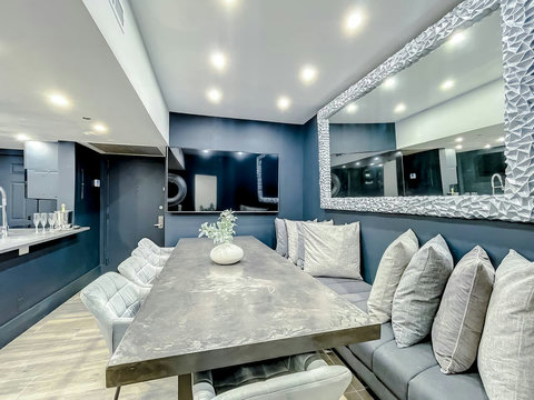 Enjoy Full-size kitchen with brand new Samsung stove, convection oven, air fryer, & island bar with in-kitchen dining. Entertain with 70-inch smart TV in the dining room, 50-inch in the kitchen, stone dining table for up to 12 persons & bar seating.

