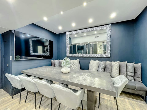 Enjoy Full-size kitchen with brand new Samsung stove, convection oven, air fryer, & island bar with in-kitchen dining. Entertain with 70-inch smart TV in the dining room, 50-inch in the kitchen, stone dining table for up to 12 persons & bar seating.
