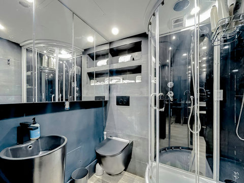 Your oasis of relaxation! Experience contemporary bathrooms with dimmer lights, double sink vanity, shower, & mirrored wall cabinets.
