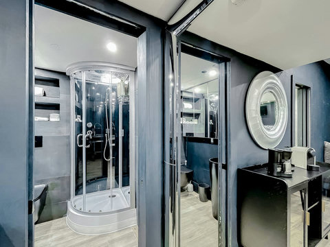 Your oasis of relaxation! Experience contemporary bathrooms with dimmer lights, double sink vanity, shower, & mirrored wall cabinets.
