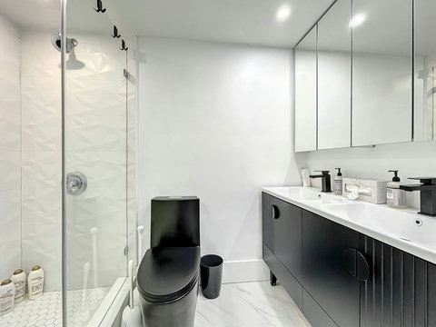 Your oasis of relaxation! Experience contemporary bathrooms with dimmer lights, double sink vanity, shower, & mirrored wall cabinets.
