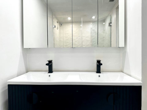 Your oasis of relaxation! Experience contemporary bathrooms with dimmer lights, double sink vanity, shower, & mirrored wall cabinets.
