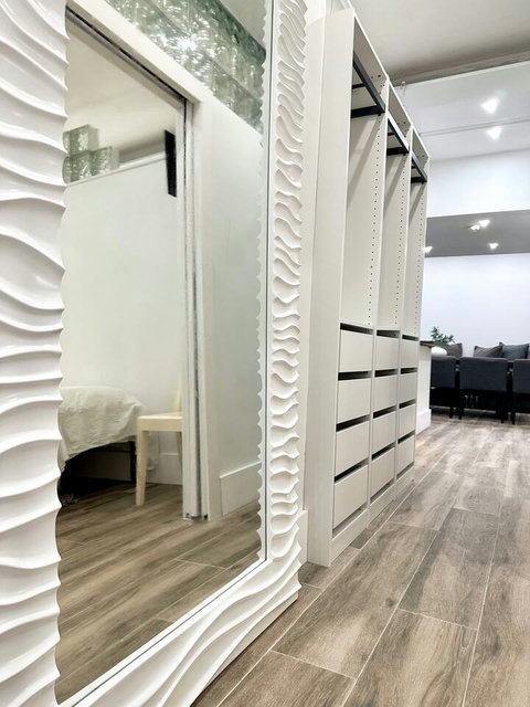Rest in comfort! Discover a bedroom with memory foam mattresses, cozy dimmer lighting, USB chargers, Designer Mirrors, and Art Deco glass design.
