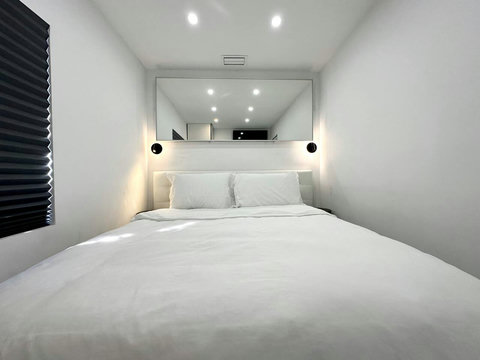 Bedroom #5: Rest easy with a queen-size bed, enjoy entertainment on the 26-inch plasma TV with cable, and keep organized with a spacious closet.