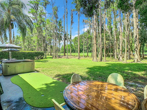 Relax in our back garden with hot tub SPA Pool (marked as a private pool in amenities) overlooking lake and Saddlebrook Resort Course. Only a stone throw about 100 yards away to Saddlebrook Golf & Tennis pro shop and resort community restaurant.
