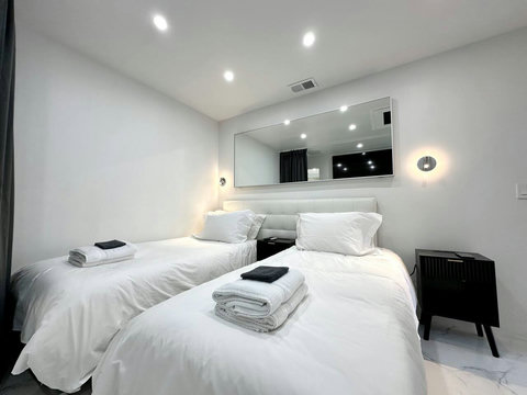 Bedroom #3: Flexible comfort with 1 king or 2 twin beds plus an extra twin, a 50-inch plasma TV with cable, and a spacious closet for your essentials.