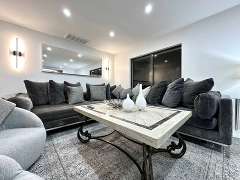 Elegant Entertaining Space - Relax in our stylish living room. Our home is just a stone's throw, about 100 yards away from Saddlebrook Golf & Country Club Resort's golf & tennis pro shop and community restaurant.
