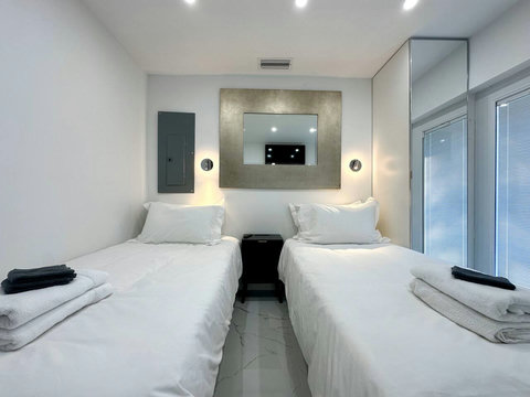 Bedroom #6: Flexible comfort with 1 king or 2 twin beds, a 26-inch plasma TV with cable, and a spacious closet for your essentials.