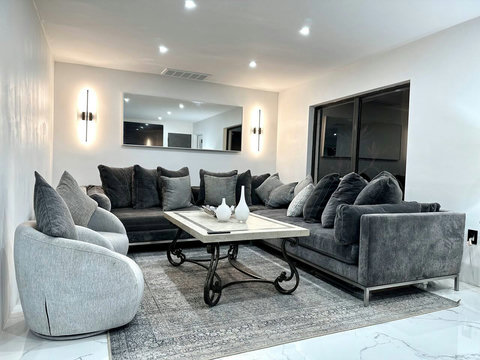 Elegant Entertaining Space - Relax in our stylish living room. Our home is just a stone's throw, about 100 yards away from Saddlebrook Golf & Country Club Resort's golf & tennis pro shop and community restaurant.
