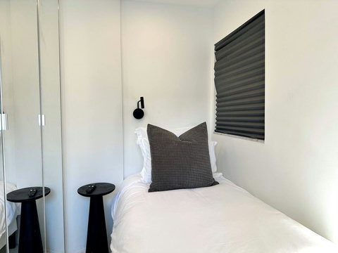 BR #4 Extra Den: 1 Single Bed right off Bedroom #4 with privacy door, 26 Inch Plasma TV with Cable TV and Closet.