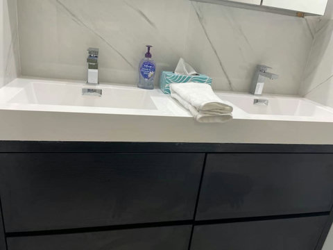 Bathroom #1: with Bathtub and Shower combination and Dual Sinks.