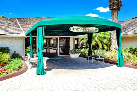 Experience the lively ambiance of TJ Dempsey's Sports Bar, conveniently located only 100 yards from our villa.
