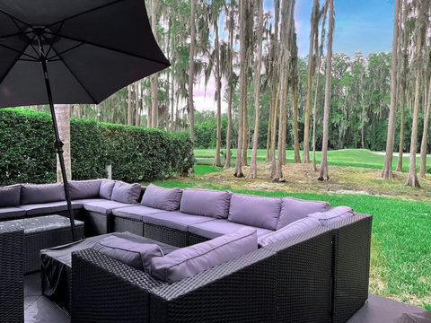 Step into serenity at our back garden with an outdoor living room style patio, offering breathtaking views of the lake and Saddlebrook Golf Resort Course. Best of all, golf, tennis, and resort dining are just a stone's throw, about 100 yards away.
