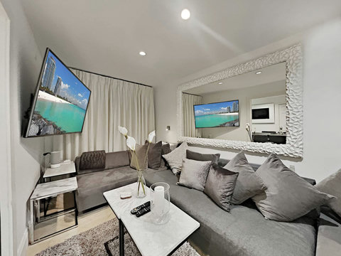 This is normally a living room (and recommended to keep it such to keep it as a living room for more social space, however it can be used as a private optional 8th bedroom  with private bath & in this case the dining room would be your meeting room).
