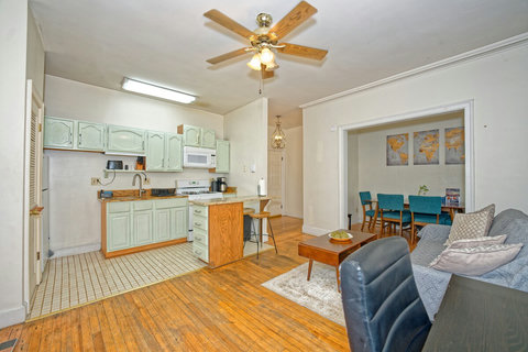 Kitchen with breakfast bar and granite countertops