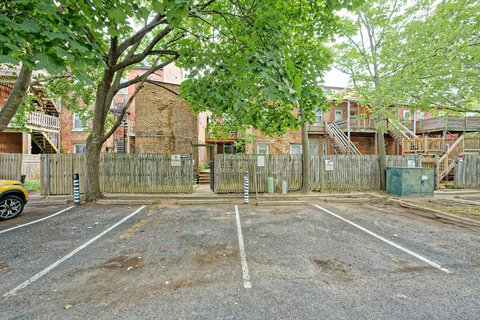 One parking spot reserved in the back, on either side of the grey 88 post (where these cars are parked). You may also park on paid parking meters on Madison Ave. (free after 5 PM and on weekends)