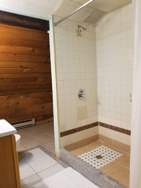 Bathroom and shower with rainfall shower head