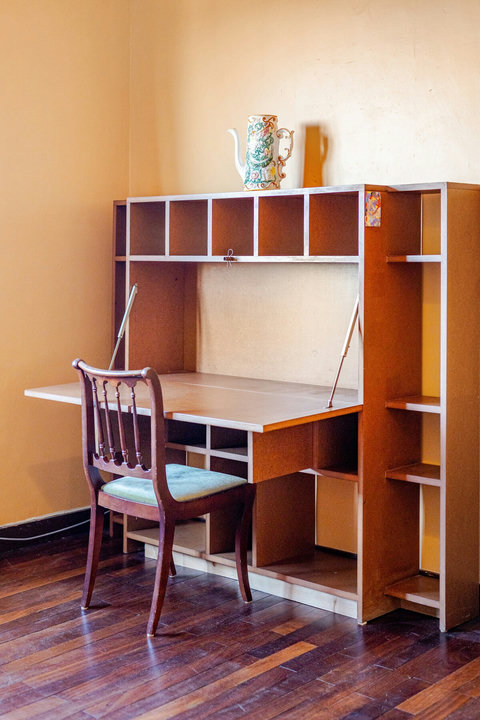 This desk is set on the main room where can be used as a workspace. 